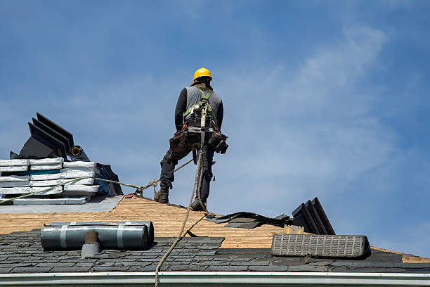Professional Roof Replacement technician working in Manchaca, TX